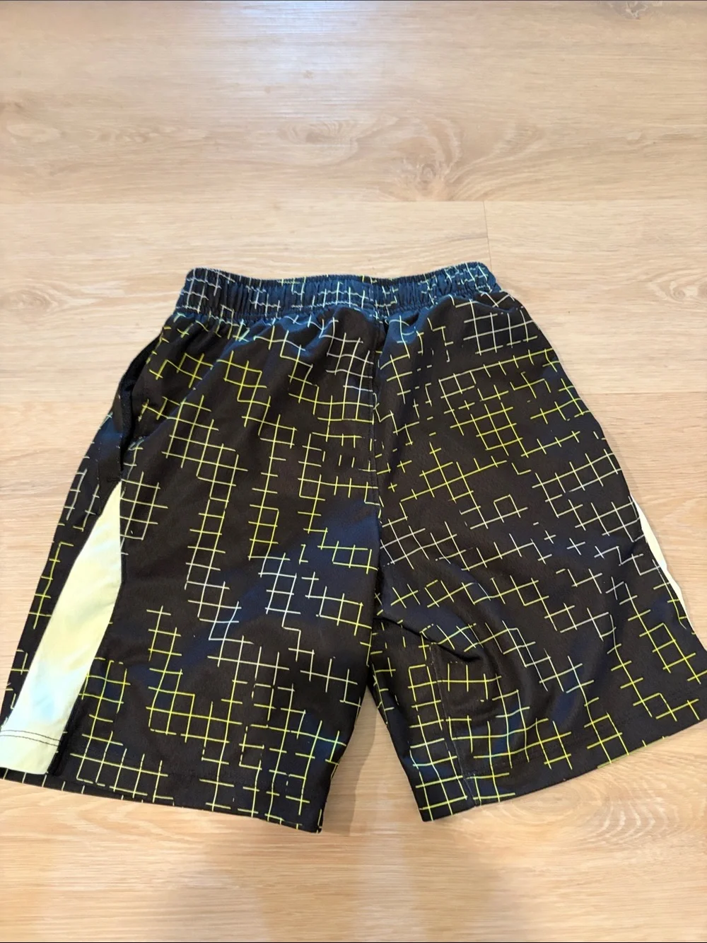 Nike Black Shorts with Yellow Grid and White Swoosh